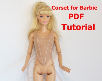 May include: A doll wearing a tan corset with white stitching, and matching underwear. The doll has blonde hair and blue eyes. Text in red reads "Corset for Barbie PDF Tutorial".