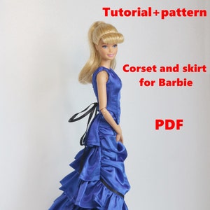 May include: A blue corset and skirt sewing pattern for Barbie dolls. The pattern includes a tutorial and is available as a PDF download.  "Tutorial + pattern. Corset and skirt for Barbie. PDF"