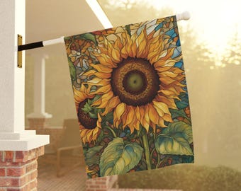May include: A garden flag featuring a close-up of two sunflowers with yellow petals and brown centers. The sunflowers are surrounded by green leaves and a background of stained glass-like patterns.
