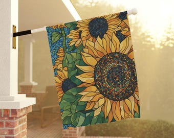 May include: A colorful mosaic-style sunflower garden flag with yellow, green, and blue hues. The flag features a close-up of several sunflowers with intricate details.