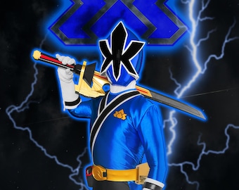May include: A blue Power Ranger costume with a black and gold sword. The costume includes a blue jumpsuit, black pants, a gold belt, white gloves, and a helmet. A blue emblem is in the background with lightning bolts.