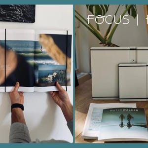 Könnte beinhalten: Lifestyle-Bild mit einem Buch, gerahmter Kunst und dekorativen Elementen. Das Bild zeigt ein offenes Buch, ein gerahmtes Kunstwerk und zwei weiße Rahmen. Der Text "FOCUS | FRAME" ist sichtbar.