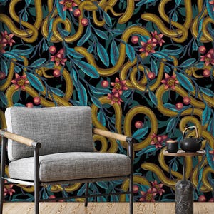 May include: Wallpaper with a repeating pattern of golden snakes, teal leaves, red berries, and pink flowers on a black background. The design is visible on the wall behind two grey chairs.