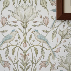 May include: Wallpaper featuring a repeating pattern of light blue birds perched on scrolling green vines with large white and pale pink flowers. The design includes intricate botanical illustrations of leaves and blossoms on a white background.