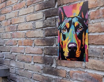 May include: A colorful, abstract painting of a Doberman Pinscher dog's face. The painting is in a variety of bright colors, including red, orange, yellow, green, blue, and purple. The dog's eyes are brown and the nose is black. The painting is mounted on a brick wall.