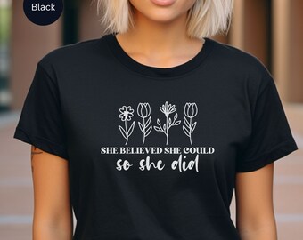 Credeva di poterlo fare, quindi ha realizzato T-shirt unisex, camicia con citazione ispiratrice, maglietta con fiori selvatici, regalo per la mamma, regalo per il compleanno, regalo per lei