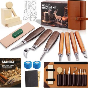 May include: A wood carving and whittling kit featuring various steel blades with dark wooden handles, a brown leather tool roll, a sharpening stone with green compound, sandpaper, two blue self-adhesive bandages, wooden blocks, and an instructional manual.