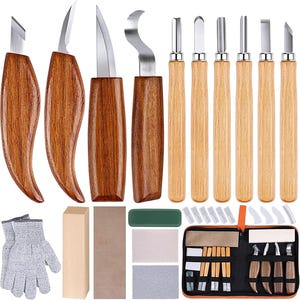 May include: A wood carving set featuring various knives with wooden handles and stainless steel blades. The set includes a variety of carving tools, gloves, sharpening stones, and a carrying case. The blades vary in shape and size, designed for detailed wood carving projects.