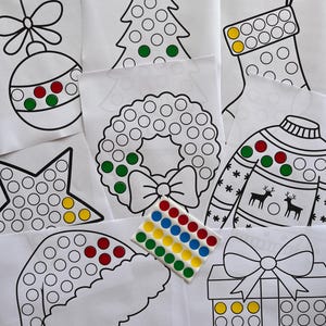 May include: A set of Christmas-themed dot-to-dot activity sheets featuring a Christmas tree, stocking, wreath, sweater, star, Santa hat, and gift box. Each sheet has a black and white outline of the image with circles for the dots. A sheet of colorful dot stickers is also included.