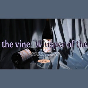 May include: Two bottles of Pinot Noir wine with a label that says "Whisper of the Vine" and "2019". The bottles are on a blue fabric background. The text "Let our Pinot Noir charm you with its rich, smooth taste. The best quality organic grapes are turned into your new favorite sip - simple, pure, and absolutely awesome. Shop Now" is also on the image.