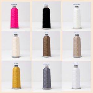 May include: Nine spools of thread in various colors, including neon pink, black, snow white, off-white, brown, beige, gold, gray, and white. Each spool has a label with a number and color name.