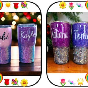 May include: Two sets of personalized purple and blue glitter tumblers with names "Kobi", "Kaylee", "Natiahna", and "Torma" written in white.