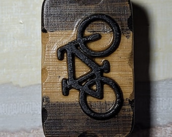 The Bicycle Slider - a 4-Click Medium-Loud Wooden Fidget Slider in Bamboo