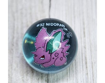 Vintage Pokémon #32 Nidoran Marble Clear Blue Glass Toy Biz Collectible Retro