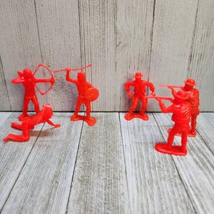 Vintage Old West Cowboys and Indians Figures Toys Red Plastic - Lot Of 6