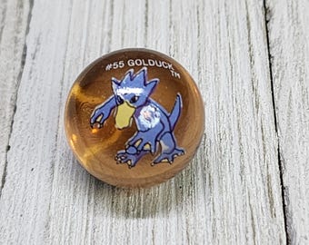 Vintage Pokémon #55 Golduck knikker van helder oranje glas, verzamelobject van Toy Biz.