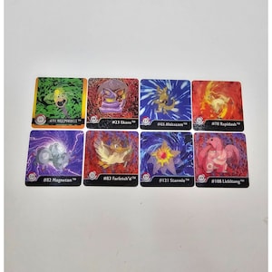 Cartas Pokémon en miniatura 3D que muestran las etapas de evolución Artbox Nintendo 1998