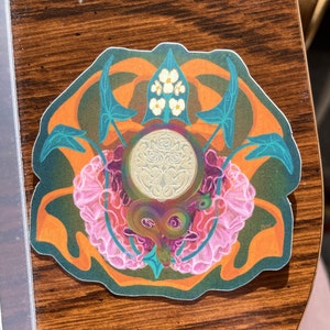 Ballad of Songbirds & Snakes collage - Lucy Gray Baird **mirrored matte sticker**