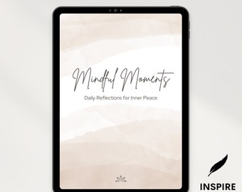 May include: A digital tablet screen displaying a journal cover with a watercolor background in shades of beige and white. The text "Mindful Moments" is written in black cursive font. Below the text, it reads "Daily Reflections for Inner Peace". A small lotus flower symbol is at the bottom of the screen. The text "Inspire Ink Journals" is displayed in black text below the tablet.