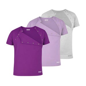 Może przedstawiać: Zestaw trzech ceramicznych kubków z nakrapianym, matowym wykończeniem. Kubki są w odcieniach kremu, jasnoszarym i ciemnoszarym. Każdy kubek ma prosty, minimalistyczny design.