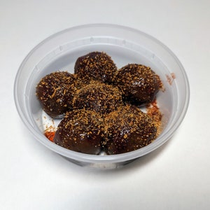 Slobber Balls covered in Tamarindo and tajin.
