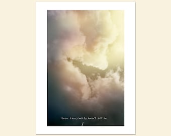 Down here, reality hasn't set in; Fine Art Print, funny subversive saying, real life observation, inspirational cloud image, dark humor
