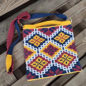 knitted handbag tablet. handbag made using jacquard technique.