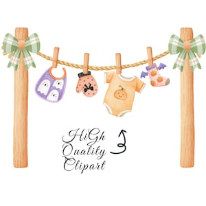 May include: Watercolor illustration of baby clothes and accessories hanging on a clothesline. Includes a bib, mittens, onesie, and a sock, all with Halloween-themed designs. The image is framed by wooden posts with green plaid bows. Text reads "High Quality Clipart."