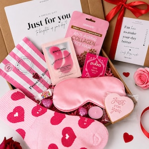 Women’s 30th birthday pamper gift box with satin eye mask,heart socks, skincare and a vegan cookie treat