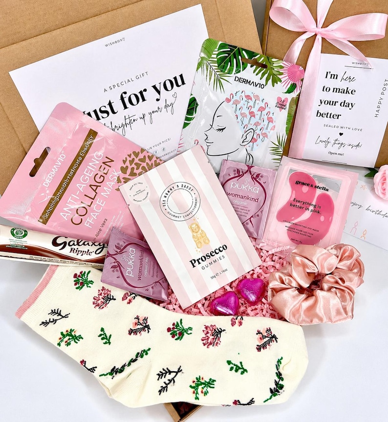 30th birthday letterbox gift for her with eye masks, face masks, chocolates and pink satin accessories