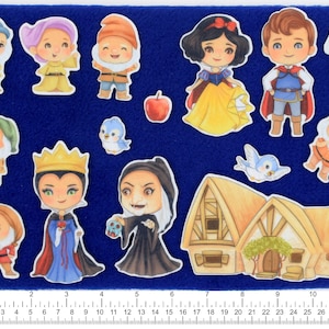 May include: A set of felt appliques featuring characters from the fairy tale Snow White. The set includes Snow White, the Evil Queen, Prince Charming, seven dwarfs, a bird, an apple, and a cottage.