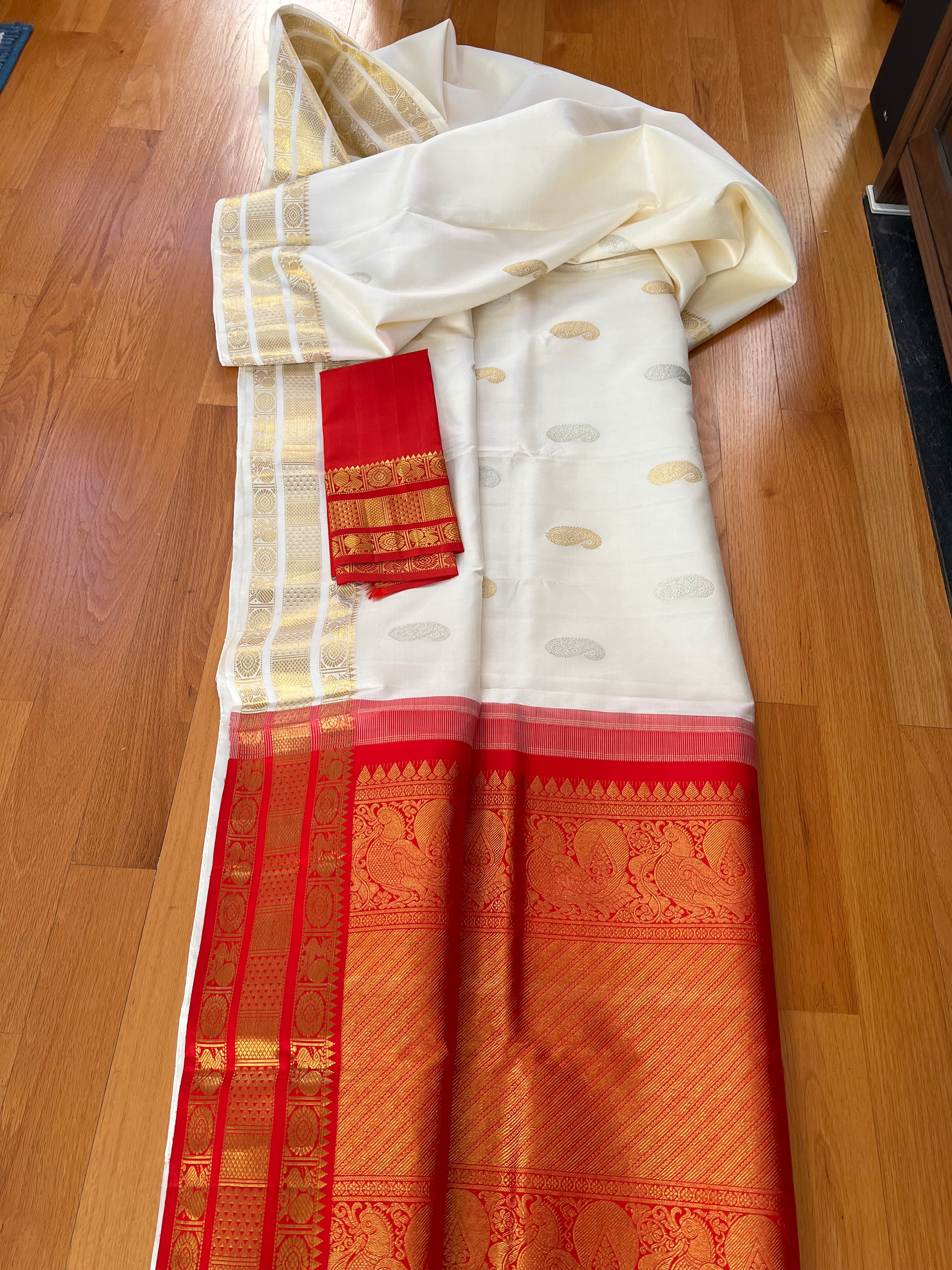 Kanjiwaram handloom White and Red Saree.