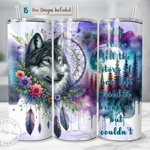 May include: A set of three sublimation tumblers featuring a watercolor design with a wolf, dreamcatcher, and forest scene. The text on the tumbler reads "My scars tell the story of how life tried to break me but couldn't".