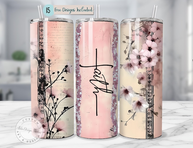 May include: Three stainless steel tumblers with floral and script designs. One features the word "Faith" in black script. The other two have pink flowers and black accents. The tumblers have a straw and the text "15 free designs included".