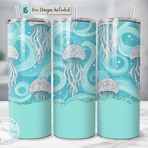 May include: Three stainless steel tumblers with a jellyfish design. The tumblers feature a turquoise and white color scheme with a jellyfish pattern and the text "15 Free Designs Included". The bottom of the tumblers are a solid turquoise color.