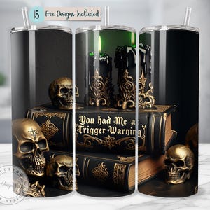May include: Black and gold tumbler with a skull and book design. The text on the book reads "You had me at trigger warning".