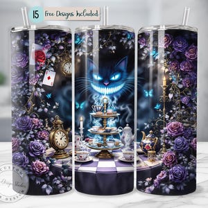 May include: A stainless steel tumbler featuring an Alice in Wonderland theme. The design includes a Cheshire Cat, roses, playing cards, and a tea party setting. The tumbler has a straw and the text "15 free Designs included".