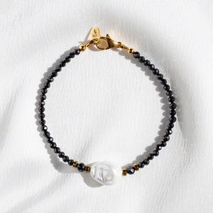 Sparkling cubic zirconia bead bracelet with faux pearl
