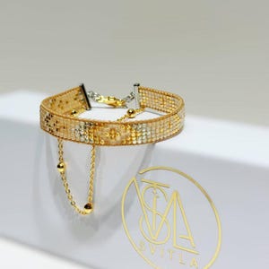 Stylish Beaded Bracelet with Chain and Ball, Handwoven Bracelet: Gold & Silver on Beige Base, Elegant Jewelry, Unique Gift Idea