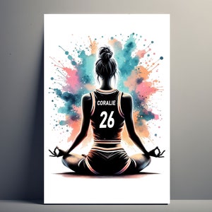 May include: A watercolor illustration of a person in a black basketball jersey with the name "CORALIE" and the number "26" on the back, sitting in a yoga pose. The background is a colorful watercolor splatter of blue, pink, and orange.