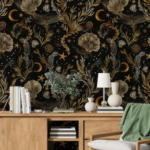 May include: Dark wallpaper featuring a repeating pattern of seashells, seaweed, stars, and crescent moons in gold and bronze tones against a black background. The design has a vintage, celestial theme.