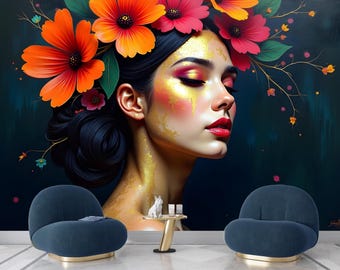 May include: A woman with gold makeup and a crown of orange and red flowers. She has her eyes closed and her lips are painted red. The background is a dark blue with a few small flowers.