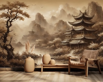 May include: A sepia-toned painting of a traditional Asian temple with a wooden bridge leading to the entrance. The temple is surrounded by mountains and trees, and there is a river flowing through the scene. The painting is framed and hanging on a wall.