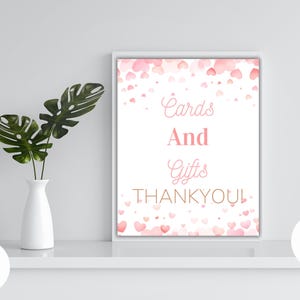 Een klein liefje is onderweg Bordje babyshowerkaarten en cadeaus | Geslachtsonthulling voor Valentijnsdag | Canvassjabloon | Afdrukbaar papieren briefpapier