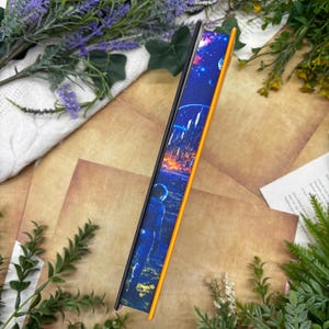 May include: A rustic wooden sign with the words "Welcome to our home" in white lettering. The sign has a distressed finish and a simple design, ideal for a porch or entrance.