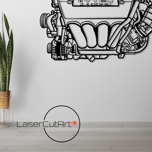 Peut inclure: Illustration en noir et blanc d'un moteur de voiture avec le texte "VTEC 2.0 DOHC" sur le dessus du bloc moteur.