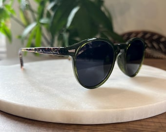 Green and tortoiseshell sunglasses