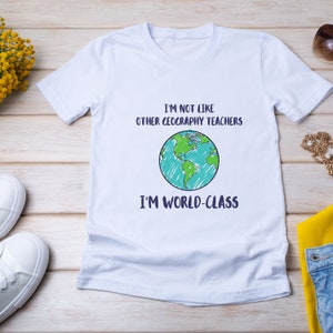 私は他の地理教師とは違います。私は世界クラスのユニセックスTシャツ、地理教師Tシャツ、地理教師ギフト、教師ギフト