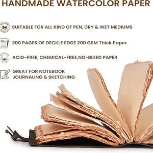 May include: Handmade watercolor paper notebook with deckle edges. The open book displays thick, cream-colored pages. Text on the image states it is suitable for pen, dry & wet mediums, with 200 pages of 200 GSM paper, acid-free, and great for journaling & sketching.