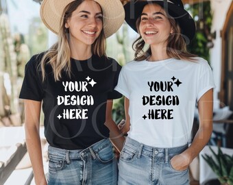 May include: Two women wearing t-shirts with the text "YOUR DESIGN HERE". One shirt is black, the other is white. Both shirts have a star graphic. They are wearing blue jeans and hats.